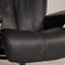Black Leather Magic Armchair with Stool and Relax Function from Stressless 5