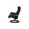 Black Leather Magic Armchair with Stool and Relax Function from Stressless 12