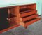 Mid-Century Italian Sideboard or Chest of Drawers with Sliding Black Laminated Doors from Saporiti Italia 5