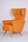 Orange Wingback Armchair, Czechia, 1950s 3