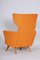 Orange Wingback Armchair, Czechia, 1950s 5