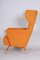 Orange Wingback Armchair, Czechia, 1950s 4