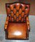 Brauner Leder Chesterfield Directors Captains Stuhl mit Porzellan Rollen 7