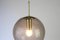 Lámpara colgante de latón con bola de vidrio ahumado de Limburg, Germany, años 70, Imagen 5