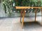 Mid-Century Coffee Table in Maple Wood with Black Glass Top 3