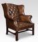 Brown Leather Upholstered Wingback Armchair 1