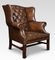 Brown Leather Upholstered Wingback Armchair, Image 1