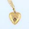 Pendentif et chaine en forme de coeur en or jaune 18 carats et rubis, années 1900 6