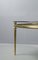 Classicist Coffee Table in Brass with Concave Fluted Legs and Smoked Glass Pane 14