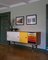 Sideboard aus Holz in warmen Farben mit einem Tablett von Finn Juhl 5