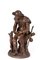 Anatole J. Guillot, Tallador de madera sentado con perro, Escultura de bronce, Imagen 2