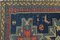 Handgefertigter orientalischer blauer Teppich mit vogelähnlichen Figuren 8