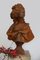 Busto femenino de hierro fundido, Imagen 12