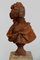 Busto femenino de hierro fundido, Imagen 1