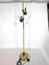 Lámpara de pie orientable de latón de Reggiani, años 70, Imagen 1