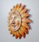 Hand-Carved Sun with Face 2