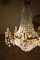 Empire Style Chiseled Brass & Crystal Drops Chandelier with 12 Lights, 1940s 7
