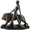 Sculpture Art Déco d'un Homme Nu Marchant avec un Lion par Max Le Verrier 1