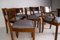 Art Deco Esszimmerstühle & Großer Esstisch Modell 569 im Stil von Hans Hartl, 7er Set 56