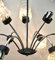 Vintage Italian Chandelier with Nine Arms and Chrome Details from Stilnovo, 1960s 10