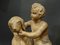 Französische Terrakotta Skulptur eines Kindes mit Hund 10