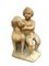 Französische Terrakotta Skulptur eines Kindes mit Hund 1