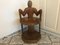 Afrikanischer Stuhl aus geschnitztem Holz 2