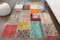 Tappeto vintage in lana patchwork, Immagine 1