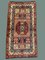 Mittelgroßer afghanischer Vintage Kazak Teppich in Blau, Rot und Beige 1