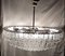 Lámpara de araña vintage grande de 6 hileras con marco de metal cromado sobre una barra de latón con platos de cristal decorados con fundas de latón, años 70, Imagen 6