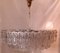 Lámpara de araña vintage grande de 6 hileras con marco de metal cromado sobre una barra de latón con platos de cristal decorados con fundas de latón, años 70, Imagen 1
