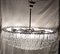 Lámpara de araña vintage grande de 6 hileras con marco de metal cromado sobre una barra de latón con platos de cristal decorados con fundas de latón, años 70, Imagen 7
