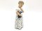 Dänische Porzellanfigur eines Mädchens mit Puppe von Royal Copenhagen 3