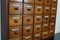 Early 20th Century German Oak Apothecary Cabinet or Bank of Drawers 13