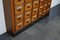 Early 20th Century German Oak Apothecary Cabinet or Bank of Drawers, Image 9