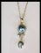 Pendant in Silver and Mother-of-Pearl with Cultured Pearl, Blue Topaz and Moonstone 1
