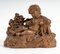 Terracotta Figurine of Child with Bird 11