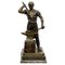 Estatua de bronce de un herrador, Imagen 1