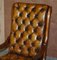 Hand Carved Chesterfield Brown Leather Rocking Armchair, 1900s 3