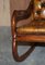 Hand Carved Chesterfield Brown Leather Rocking Armchair, 1900s 9