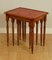 Yew and Red Leather Embossed Nesting Tables 11