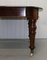 Victorian Mahogany Extendable Brown Dining Table with Two Original Leaves 9
