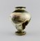 Danish Glazed Ceramics Vase with Flowers on a Cream Colored Background from Kähler 2