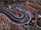 Felix Cesare, A Long Exposure of Vehicles Movement with Blurring and Light-Trails on a Winding Road During the Night, Photographic Paper, Image 1