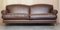 Large Contemporary Solid Brown Sofa with Brass Castors in the Style of Howard & Sons 2
