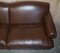 Large Contemporary Solid Brown Sofa with Brass Castors in the Style of Howard & Sons 6