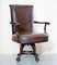 Antique Brown Leather Swivel Captains Chair with Claw & Ball Feet from Thomas Chippendale 2