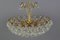 Seven Light Crystal Glass and Gilt Brass Chandelier, Germany, 1970s 6