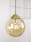Mid-Century Globe Pendant in Yellow Glass and Brass 1