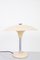 Lampada da tavolo in metallo color crema con paralume a forma di razzo, anni '50, Immagine 1
